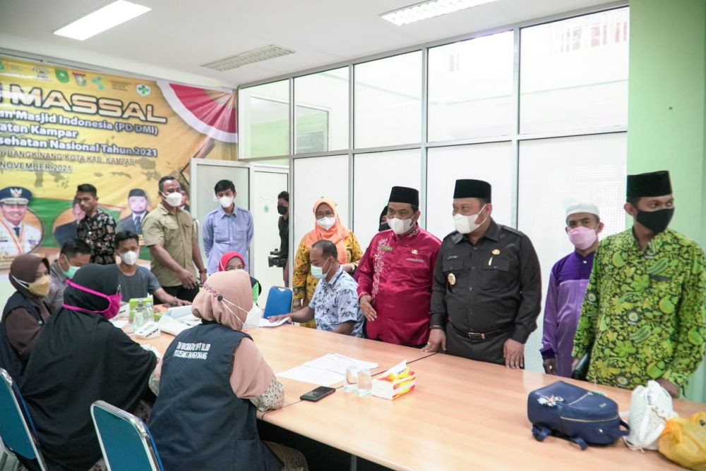 DMI Kampar Bekerja Sama dengan SKK Migas Gelar Vaksinasi Massal