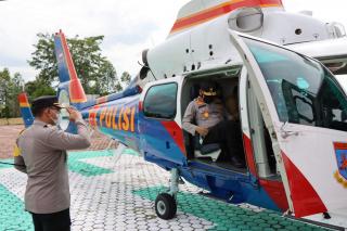 Pakai Helikopter, Kapolda Riau Pantau Illegal Logging di Rohil Dari Udara