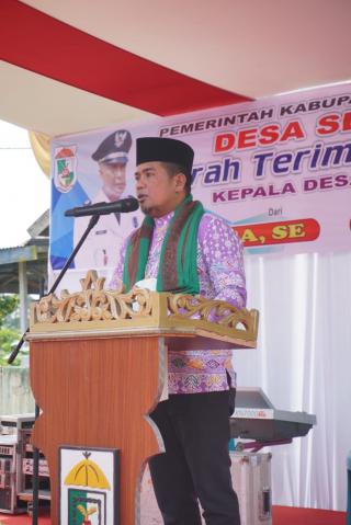 Bupati Pelalawan Hadiri Pisah Sambut dan Syukuran Kepala Desa Sering