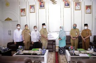 Serahkan Santunan Jaminan Kematian, Bupati Siak: Semoga Program BPJS Ini Terus Berlanjut