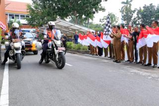 Sekdako Pekanbaru Lepas Tim Satgas Merah Putih, Sebar 10 Ribu Bendera ke Warga