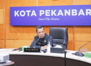 Pj Walikota Pekanbaru Bakal Tinjau Ulang Regulasi Kenaikan Tarif Parkir Tepi Jalan Umum