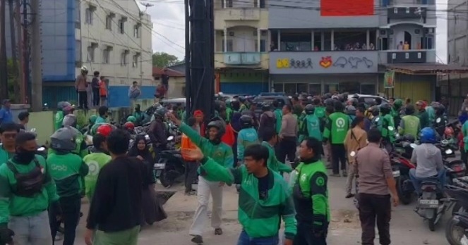 Viral Pengemudi Ojol Dikeroyok Juru Parkir, Ini Penjelasan Polisi