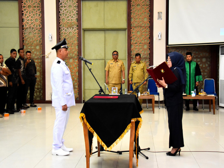 Pj Sekda Kampar Lantik Rusli Wahid sebagai Pj Kades Pantai Cermin