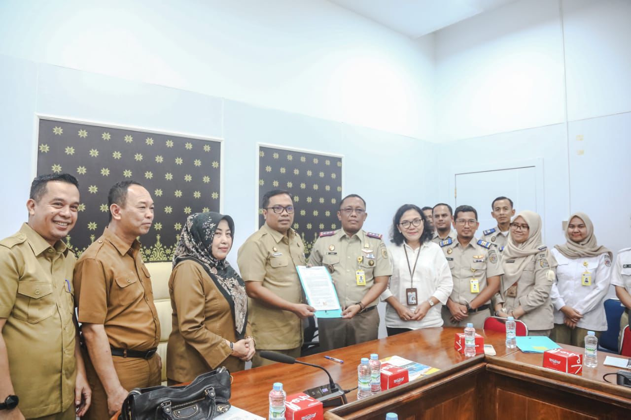 Pemko Pekanbaru Tandatangani Pelepasan Hak Aset Tanah untuk Pembangunan Tol Pekanbaru - Rengat