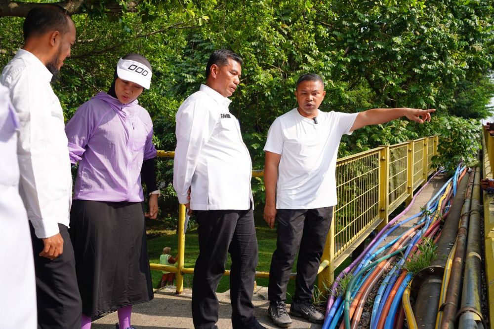 Gubri Wahid Respon Cepat Permasalahan Kabel Semrawut di Jembatan Siak I