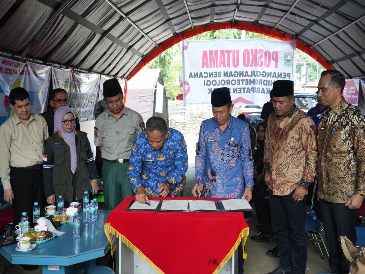 Pemkab Kampar–Pemkab Solok Tandatangan MoU Penyediaan dan Pendistribusian Beras Bantuan Sosial