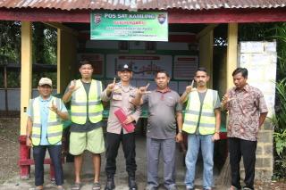 Bupati Anton Ajak Seluruh Desa di Rohul Contoh Bhabinkamtibmas Koto Tinggi dalam Penguatan Satkamling