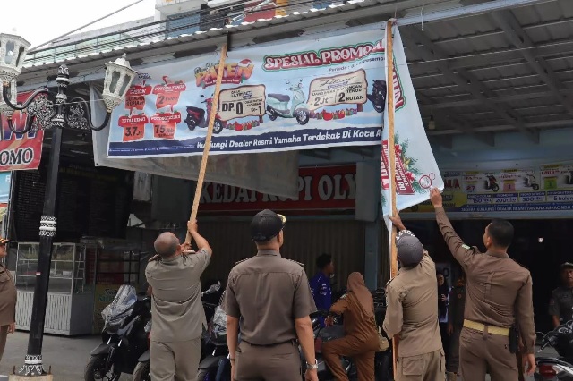 Satpol PP Siak Tertibkan Reklame Liar, Tegakkan Perda dan Tingkatkan Kepatuhan Pajak